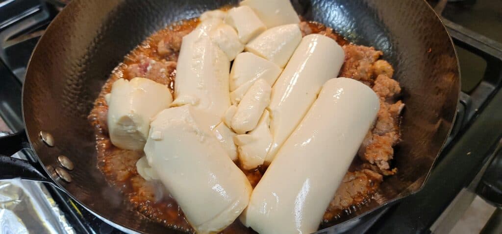 Minced Pork with Soft Tofu - adding tofu and sauce